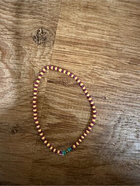 Yellow and Magenta Seed Bead Stretch Bracelet with Teal Accent
